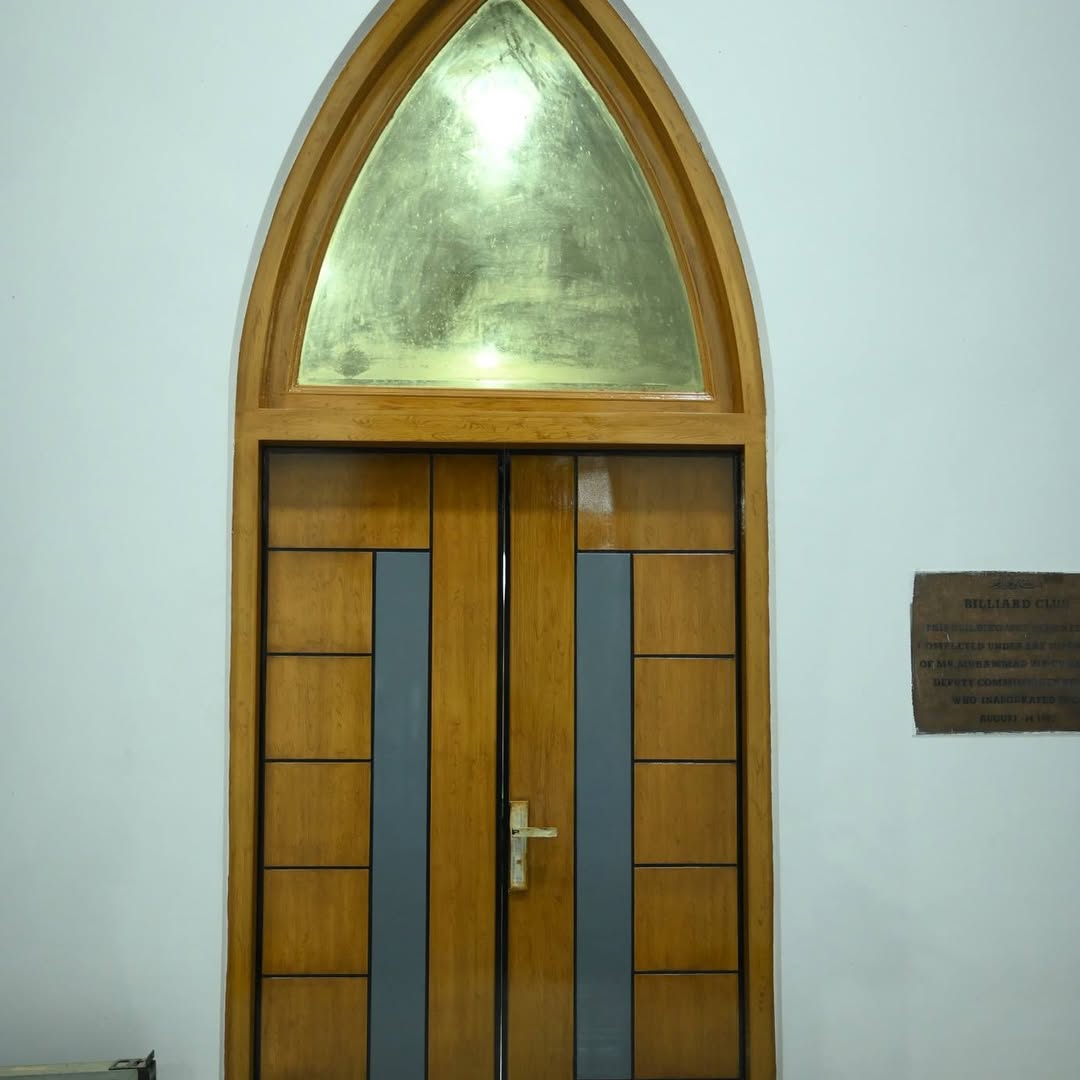 Carved wooden door at the club
