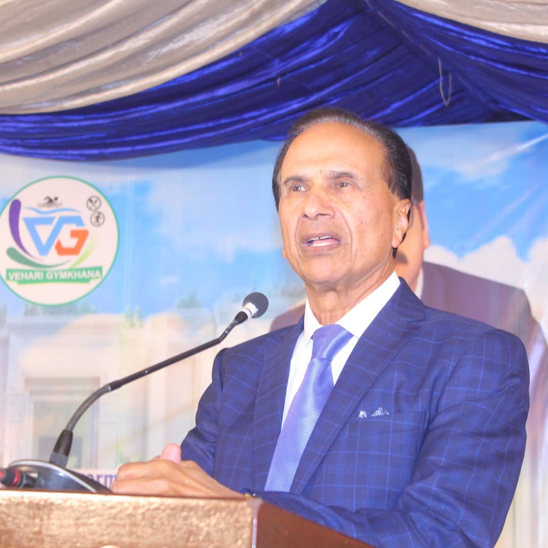 A speaker addressing members at a club gathering